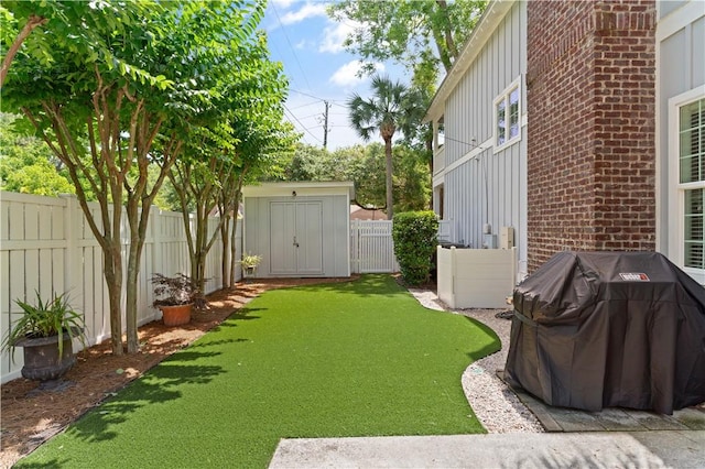 1073 Demere Rd, Saint Simons Island, GA 31522 - fenced backyard with a storage unit and an outdoor structure