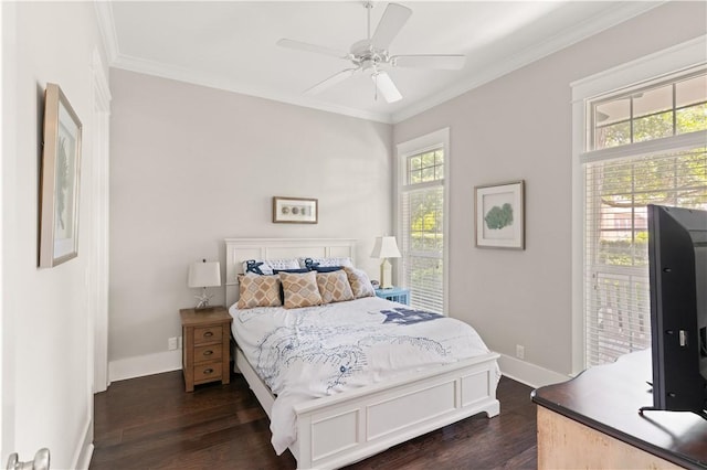 1073 Demere Rd, Saint Simons Island, GA 31522 - bedroom with crown molding, dark wood-type flooring, baseboards, ceiling fan, and access to exterior