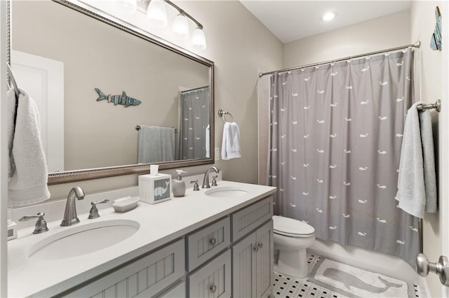 1073 Demere Rd, Saint Simons Island, GA 31522 - bathroom with tile patterned flooring, toilet, double vanity, and shower / bath combination with curtain