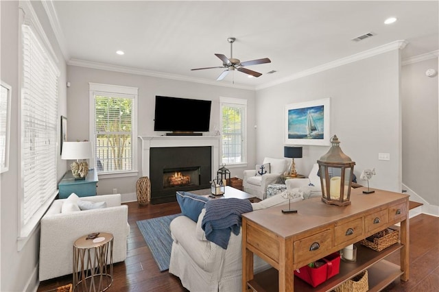 1073 Demere Rd, Saint Simons Island, GA 31522 - living room with plenty of natural light, a ceiling fan, dark wood finished floors, ornamental molding, and recessed lighting