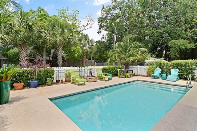 1073 Demere Rd, Saint Simons Island, GA 31522 - view of swimming pool with fence and a patio