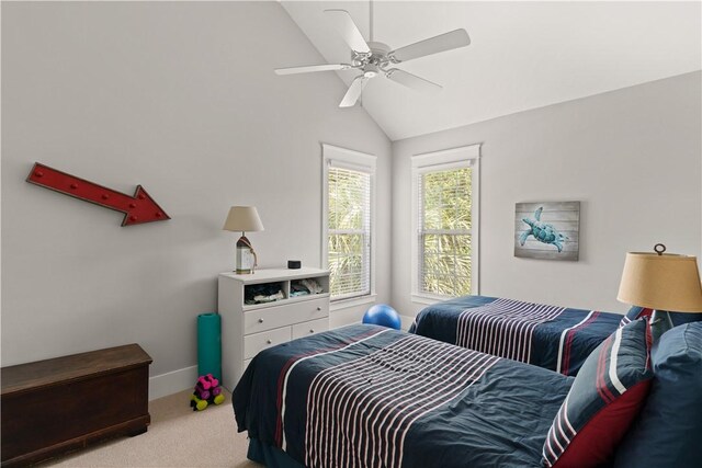1073 Demere Rd, Saint Simons Island, GA 31522 - bedroom featuring light colored carpet, lofted ceiling, a ceiling fan, and baseboards
