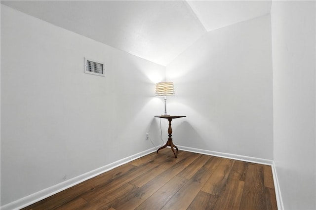 604 Union St, Brunswick, GA 31520 - spare room featuring lofted ceiling and hardwood / wood-style flooring