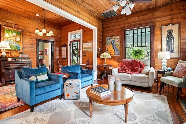 604 Union St, Brunswick, GA 31520 - living area featuring wooden walls, healthy amount of natural light, hardwood / wood-style floors, a ceiling fan, and wooden ceiling