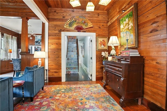 604 Union St, Brunswick, GA 31520 - entrance foyer featuring wooden walls, wood finished floors, wooden ceiling, stairs, and ornate columns