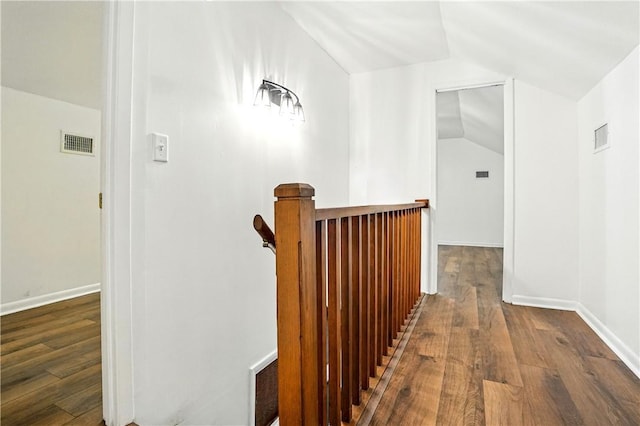 604 Union St, Brunswick, GA 31520 - hall with wood finished floors, an upstairs landing, and vaulted ceiling