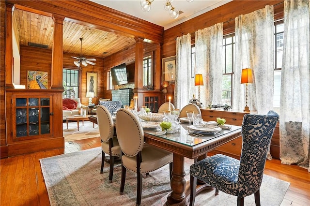 604 Union St, Brunswick, GA 31520 - dining space featuring wood walls, healthy amount of natural light, hardwood / wood-style floors, ceiling fan, and a wooden ceiling with exposed beams