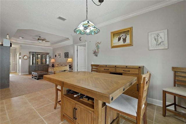 199 Austin Ryan Dr, Kingsland, GA 31548 - dining room with baseboards, light carpet, crown molding, a ceiling fan, and light tile patterned floors