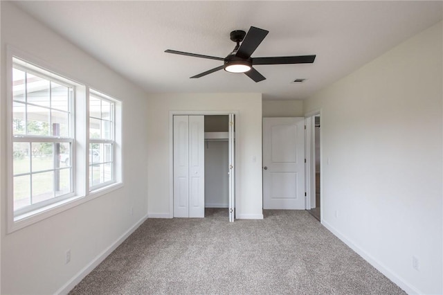 3 Dixon Ln, Blackshear, GA 31516 - unfurnished bedroom featuring carpet floors, baseboards, a closet, and ceiling fan