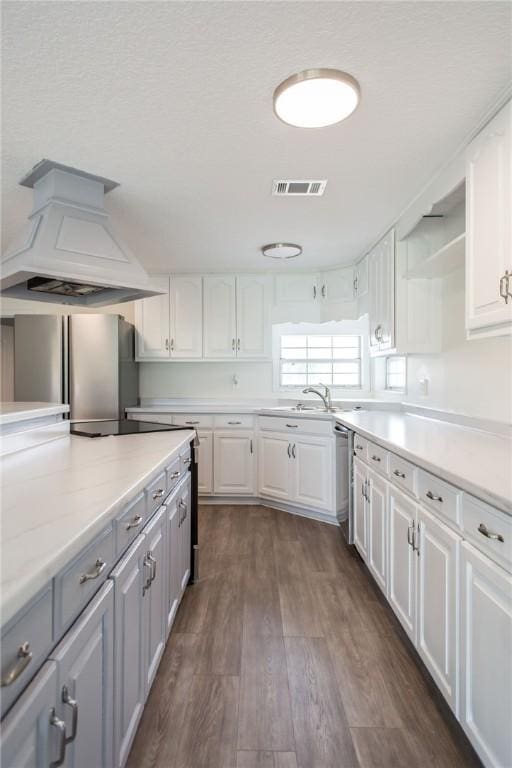 3 Dixon Ln, Blackshear, GA 31516 - kitchen featuring white cabinetry, appliances with stainless steel finishes, a sink, and dark wood-type flooring