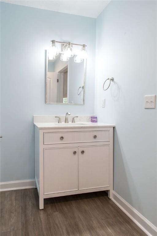 3 Dixon Ln, Blackshear, GA 31516 - bathroom featuring wood finished floors, vanity, and baseboards