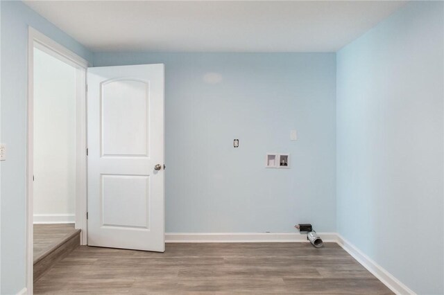 3 Dixon Ln, Blackshear, GA 31516 - laundry area with light wood finished floors, baseboards, and washer hookup
