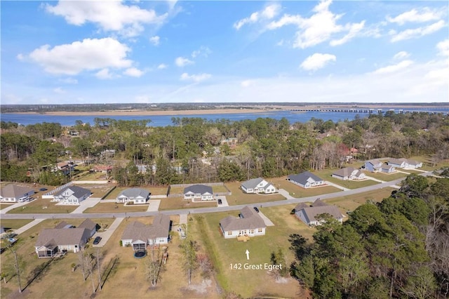 birds eye view of property with a residential view