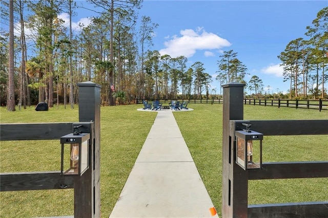 exterior space featuring a yard and fence