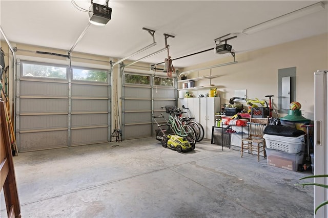 garage featuring a garage door opener