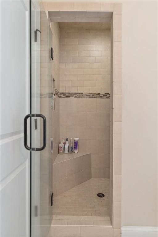 bathroom with an enclosed shower