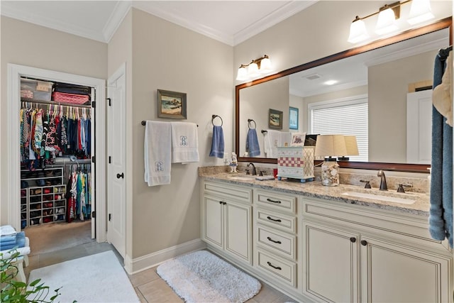 bathroom with vanity, tile patterned flooring, and crown molding