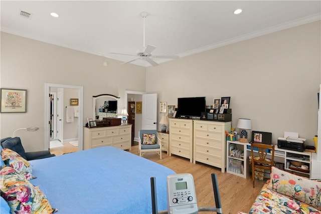 bedroom featuring ceiling fan, crown molding, and light wood-type flooring