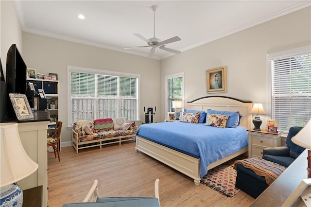 bedroom featuring ceiling fan, light hardwood / wood-style floors, and ornamental molding