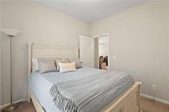 138 Clearwater Dr, Brunswick, GA 31523 - carpeted bedroom featuring baseboards