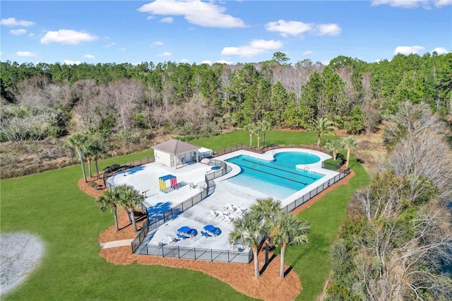 138 Clearwater Dr, Brunswick, GA 31523 - community pool with a patio and a wooded view
