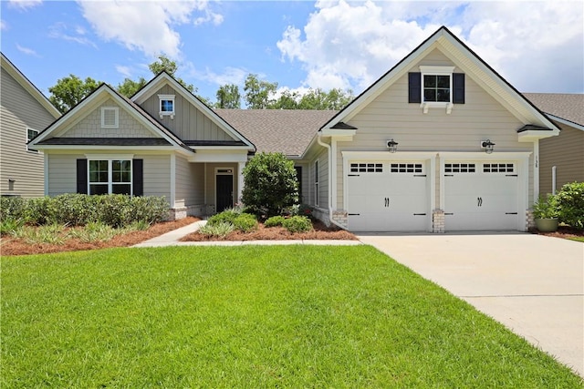 138 Clearwater Dr, Brunswick, GA 31523 - craftsman-style home featuring board and batten siding, concrete driveway, and a front yard