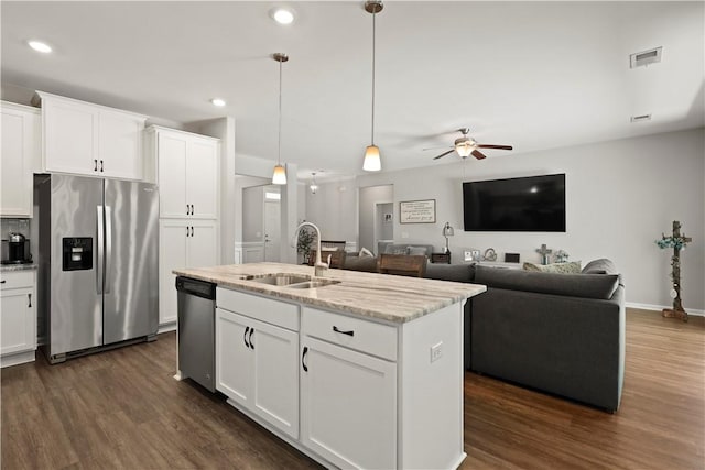 138 Clearwater Dr, Brunswick, GA 31523 - kitchen featuring appliances with stainless steel finishes, a sink, dark wood-type flooring, and recessed lighting