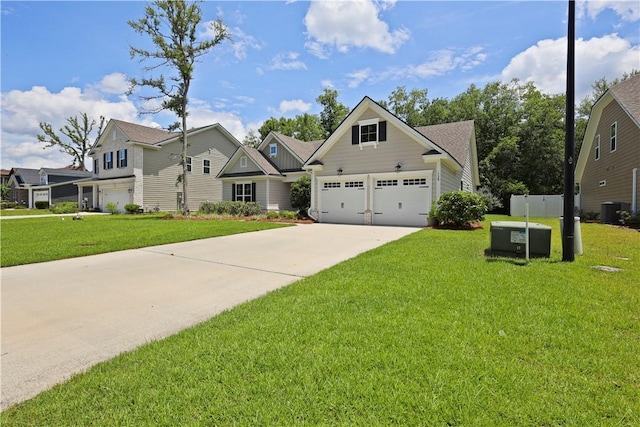 138 Clearwater Dr, Brunswick, GA 31523 - craftsman-style home featuring concrete driveway, central air condition unit, and a front yard