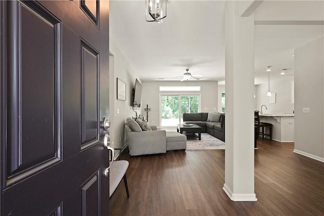 138 Clearwater Dr, Brunswick, GA 31523 - entryway featuring dark wood-type flooring, baseboards, and a ceiling fan
