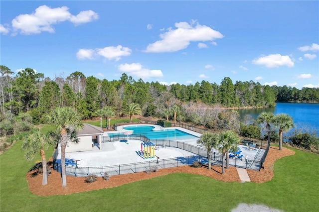 138 Clearwater Dr, Brunswick, GA 31523 - community pool featuring a patio, a water view, and a wooded view