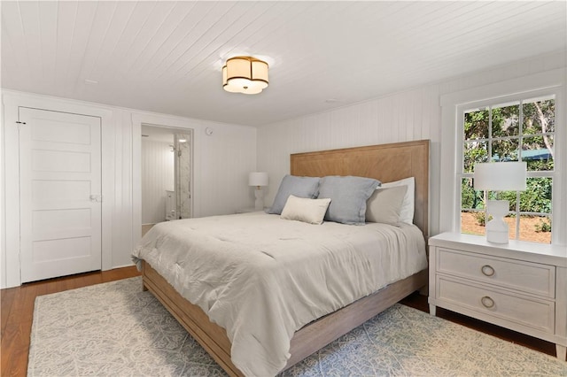 bedroom with wood-type flooring