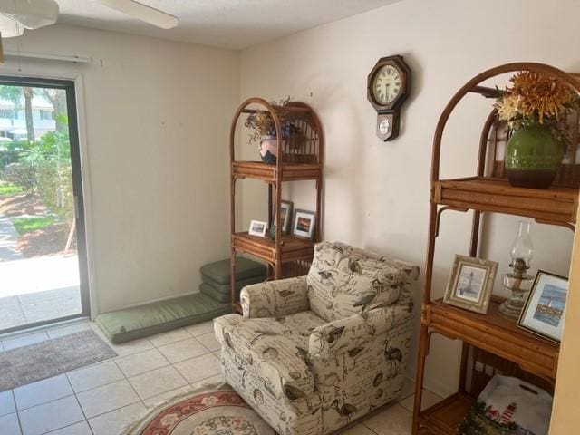 sitting room with light tile patterned flooring