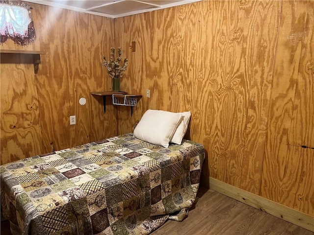 bedroom with wood-type flooring