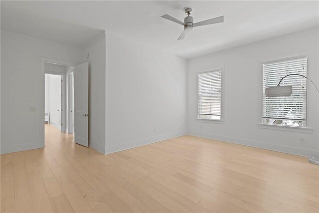 4 Lake View Cottages Ct, Saint Simons Island, GA 31522 - spare room with light wood finished floors, a ceiling fan, and baseboards