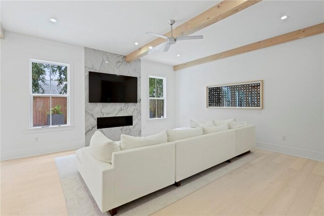 4 Lake View Cottages Ct, Saint Simons Island, GA 31522 - living area with beamed ceiling, wood finished floors, recessed lighting, baseboards, and a ceiling fan