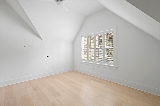 4 Lake View Cottages Ct, Saint Simons Island, GA 31522 - additional living space with light wood-type flooring, vaulted ceiling, baseboards, and a ceiling fan