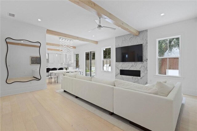 4 Lake View Cottages Ct, Saint Simons Island, GA 31522 - living room featuring ceiling fan, beam ceiling, light wood-style flooring, a fireplace, and recessed lighting