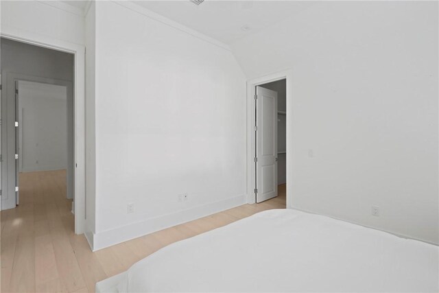 4 Lake View Cottages Ct, Saint Simons Island, GA 31522 - bedroom with light wood-style floors and baseboards