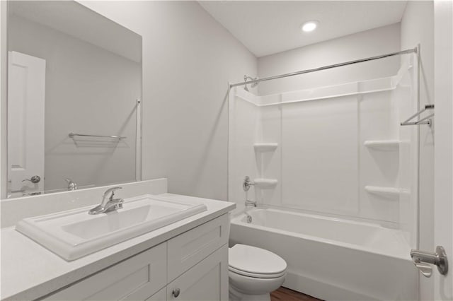 full bathroom with vanity, toilet, and bathtub / shower combination