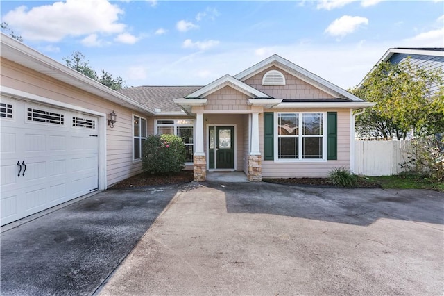 view of front of property featuring a garage