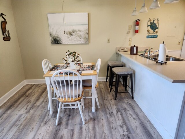 1175 N Beachview Dr Unit 286, Jekyll Island, GA 31527 - dining room featuring hardwood / wood-style flooring and sink