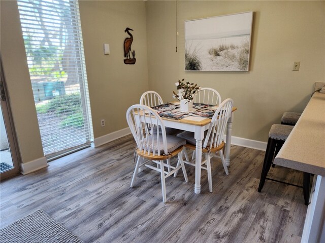 1175 N Beachview Dr Unit 286, Jekyll Island, GA 31527 - dining space with wood-type flooring and plenty of natural light