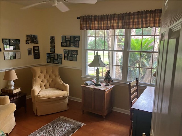 7 Hyde Ave, Jekyll Island, GA 31527 - living area with wood finished floors, baseboards, and a ceiling fan