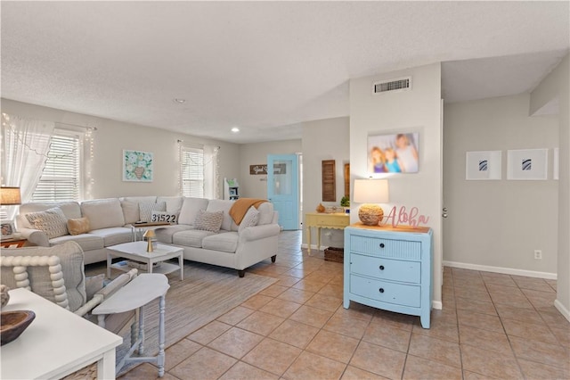 living room featuring light tile patterned floors