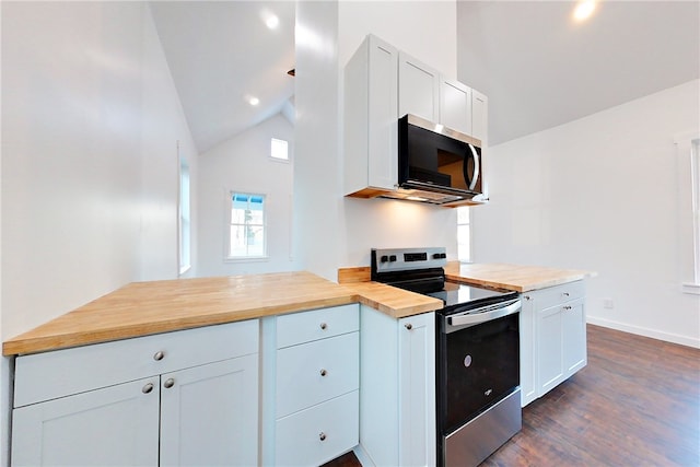 kitchen with dark wood-type flooring, wood counters, stainless steel appliances, and white cabinets