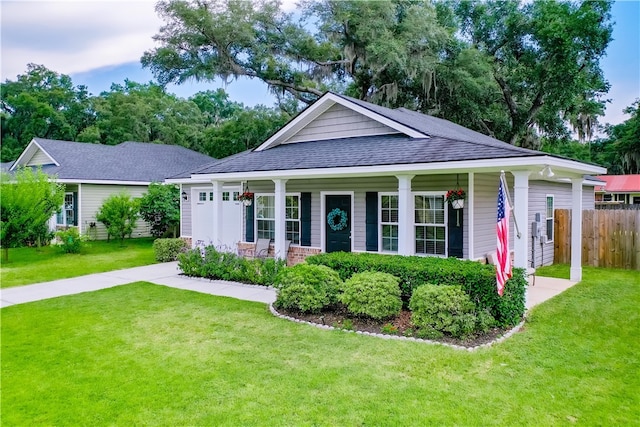 288 Bridgewater Ln, Darien, GA 31305 - view of front of property with covered porch and roof with shingles