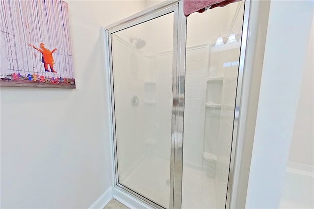 288 Bridgewater Ln, Darien, GA 31305 - bathroom with a shower stall and baseboards