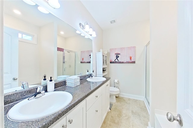 288 Bridgewater Ln, Darien, GA 31305 - bathroom with a stall shower, double vanity, and tile patterned flooring