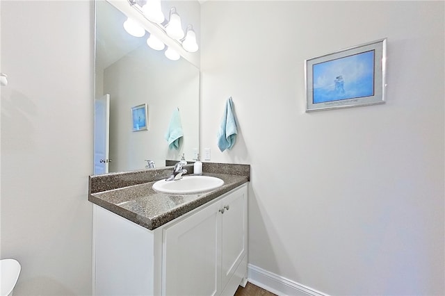 288 Bridgewater Ln, Darien, GA 31305 - half bathroom featuring vanity and toilet