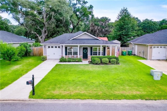 288 Bridgewater Ln, Darien, GA 31305 - single story home with a porch, driveway, and a garage